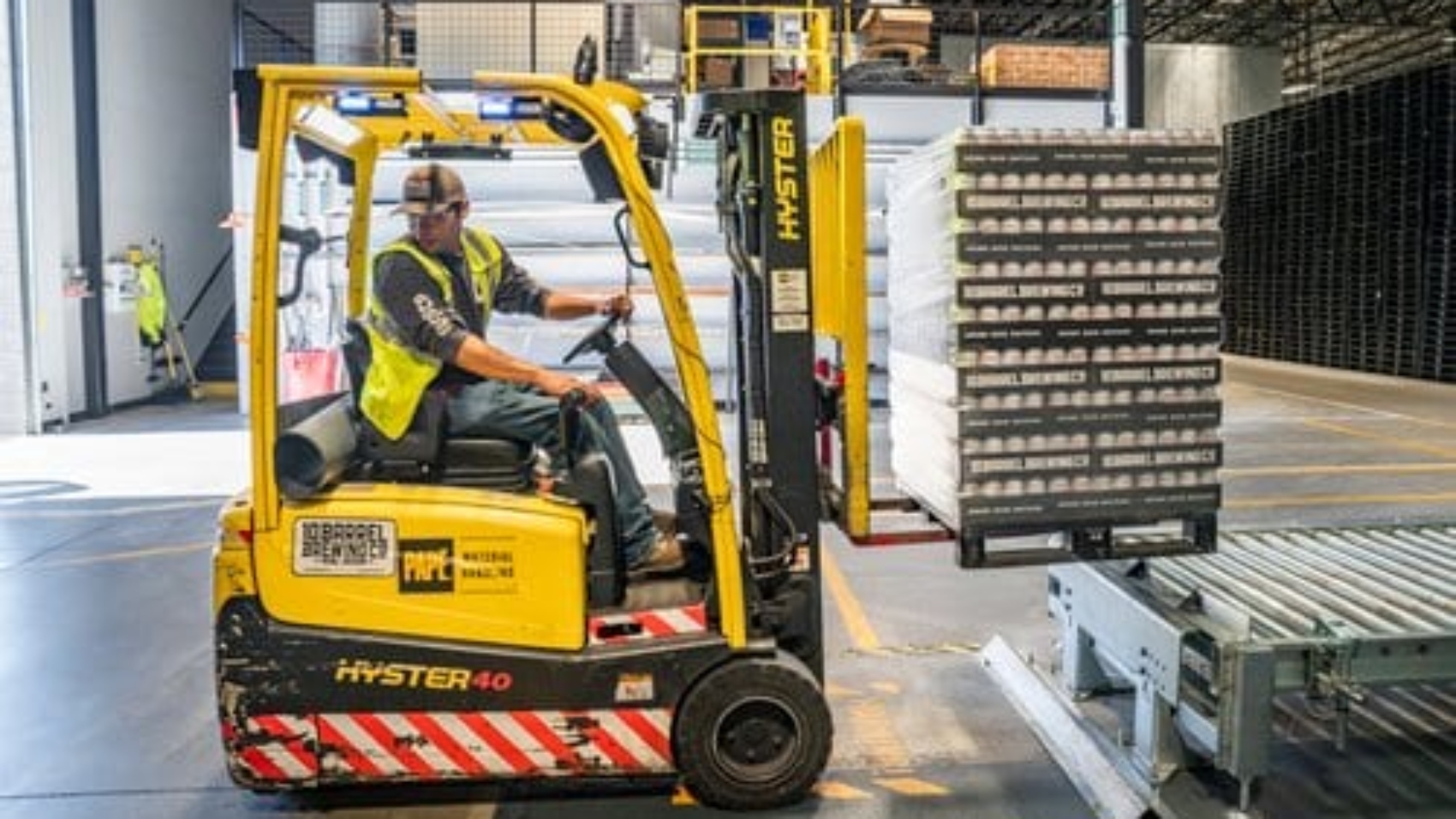 warehouse-worker-using-forklift