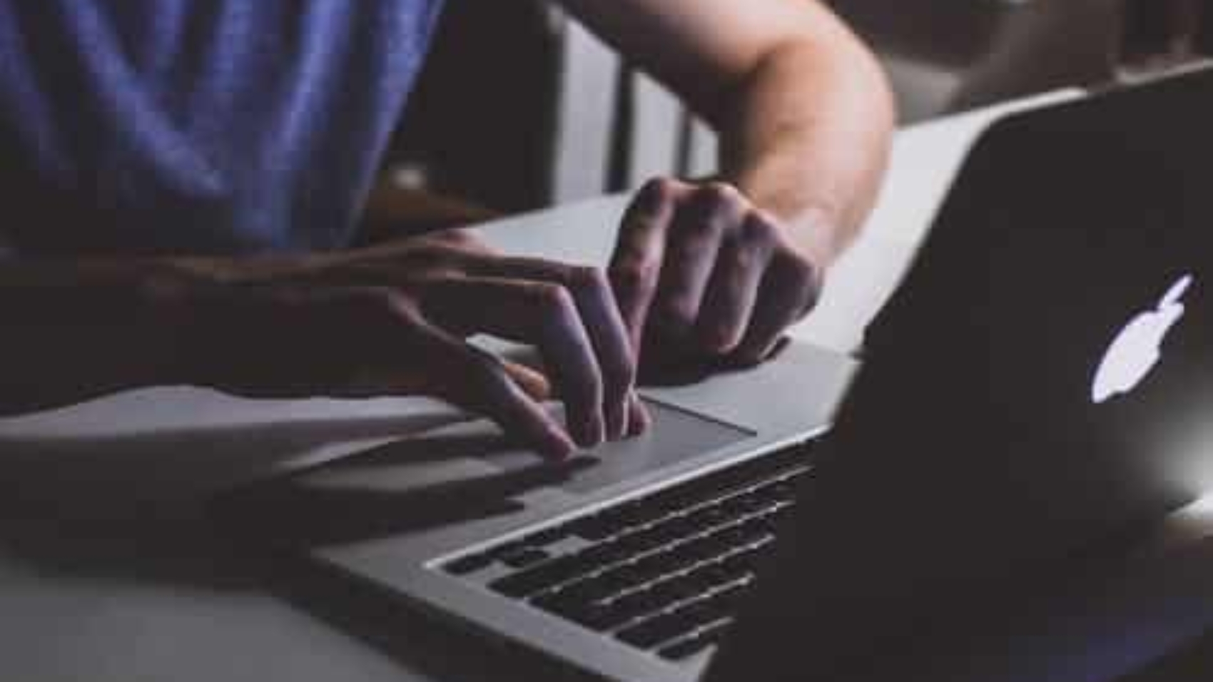 hands-operating-laptop