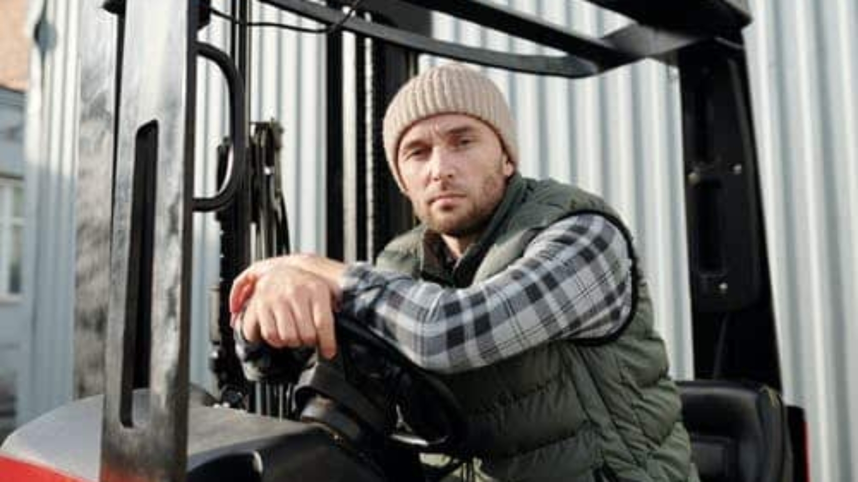 man-sitting-in-forklift