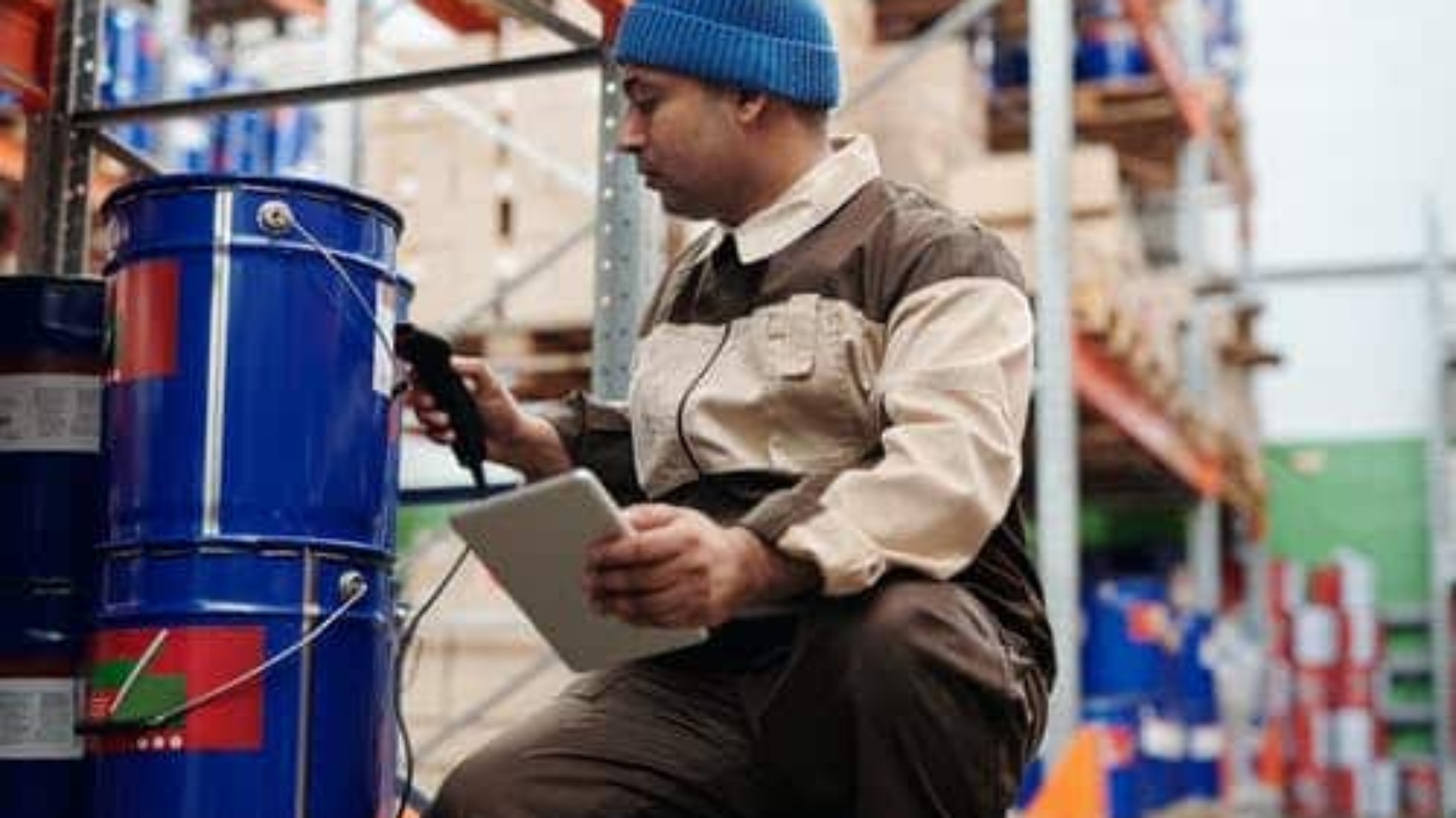man-using-tablet-to-check-inventory
