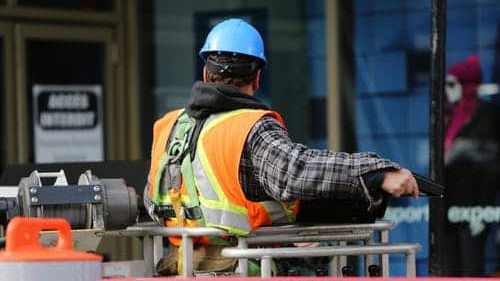 worker-in-hard-hat-facing-away-from-camera