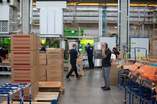 warehouse crew working and moving items