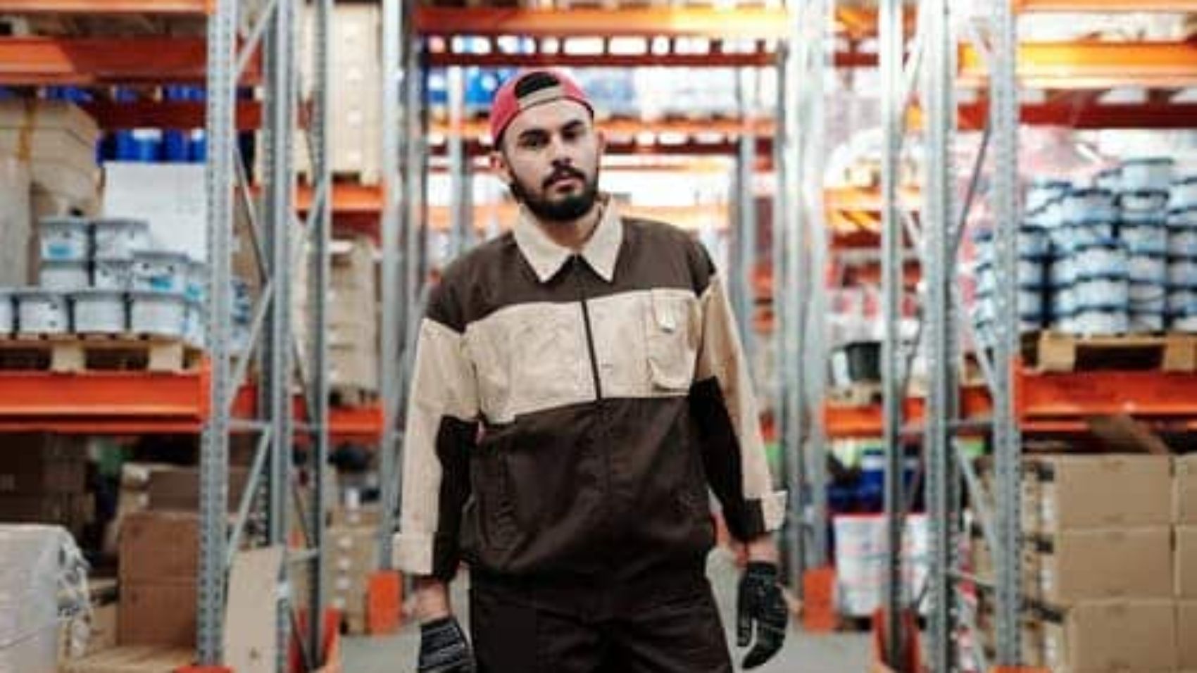 warehouse worker standing in isle