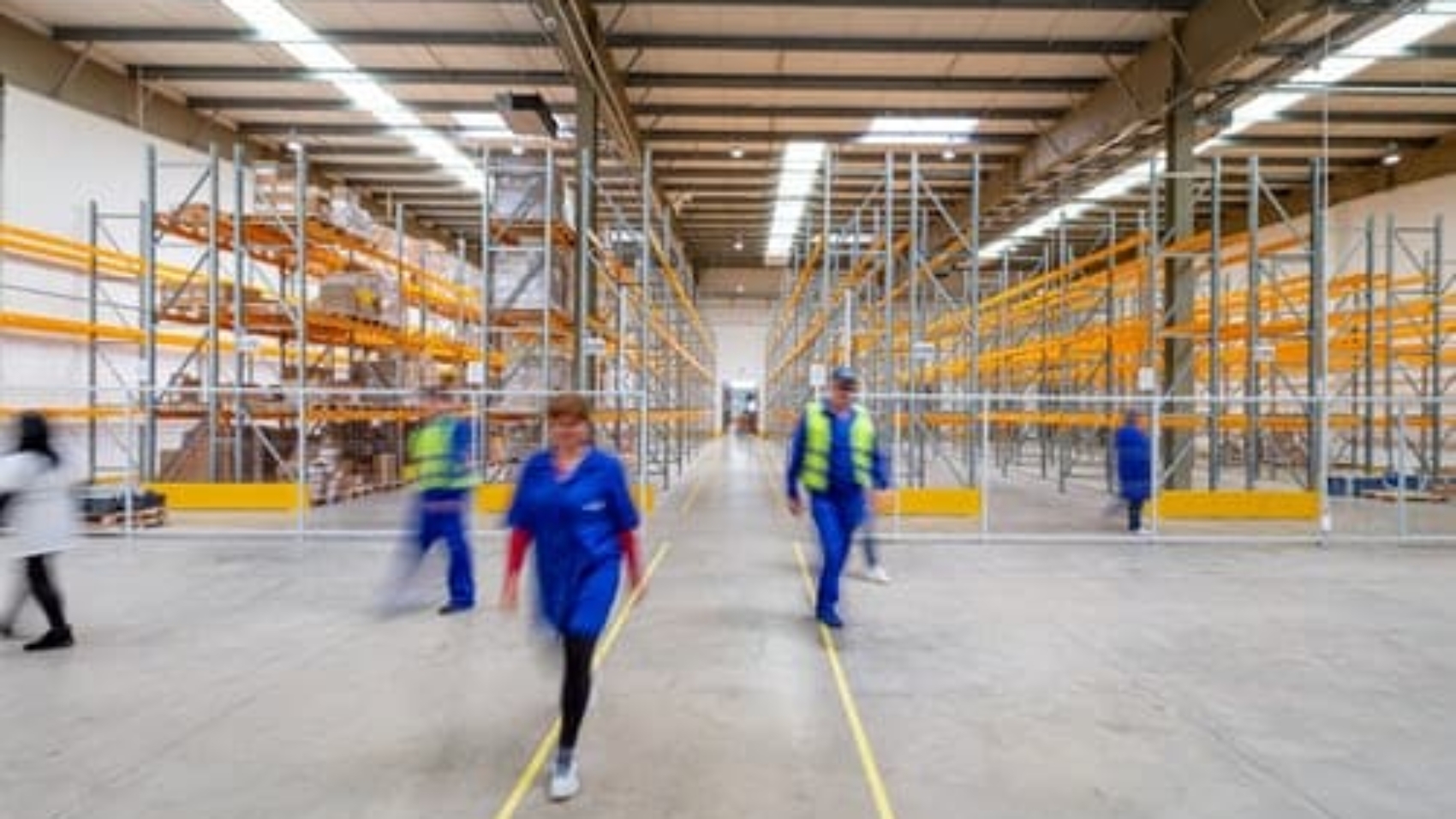 workers walking through a warehouse