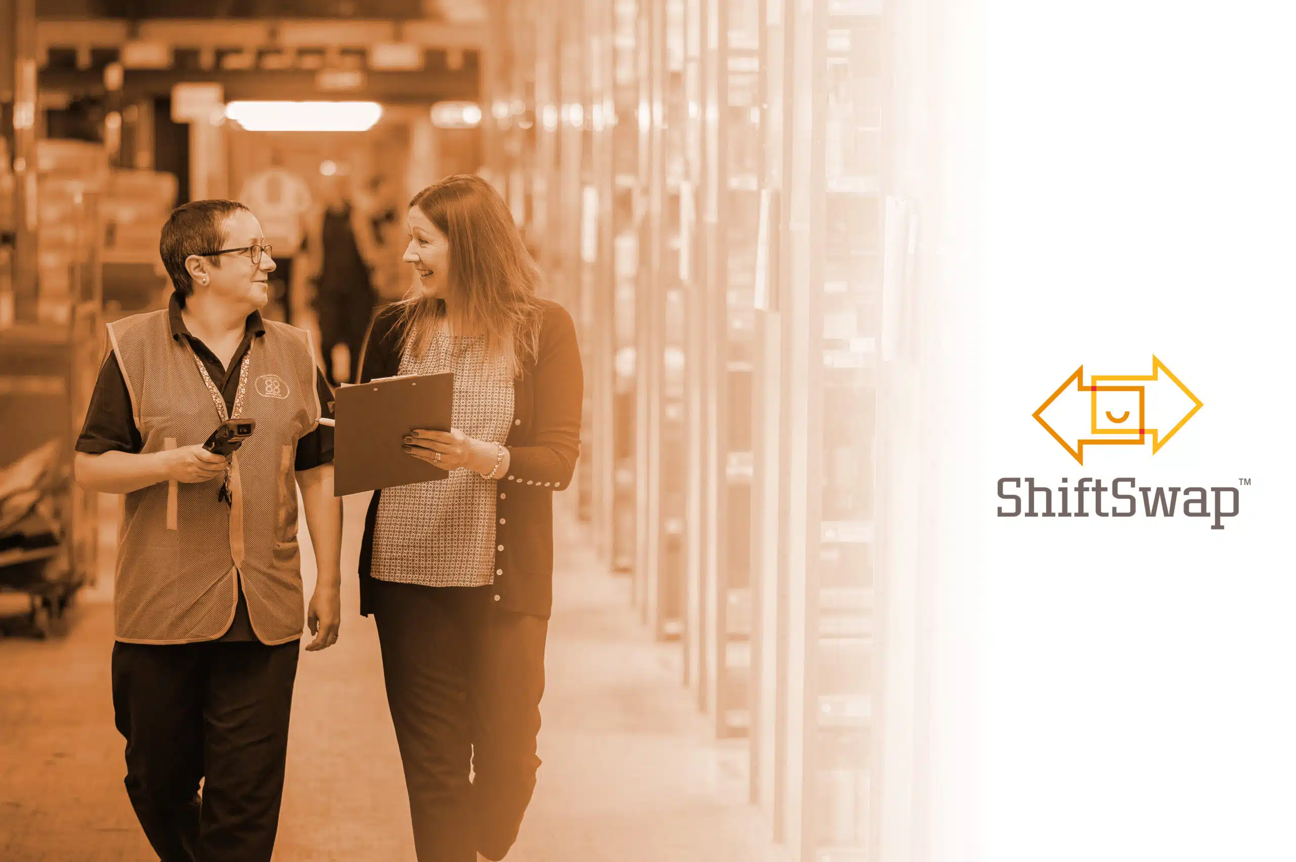 Two women walking in a warehouse, one with a clipboard. Featured image for Top 5 Benefits of Flexibility for Your Hourly Workforce with the ShiftSwap™ logo on the right