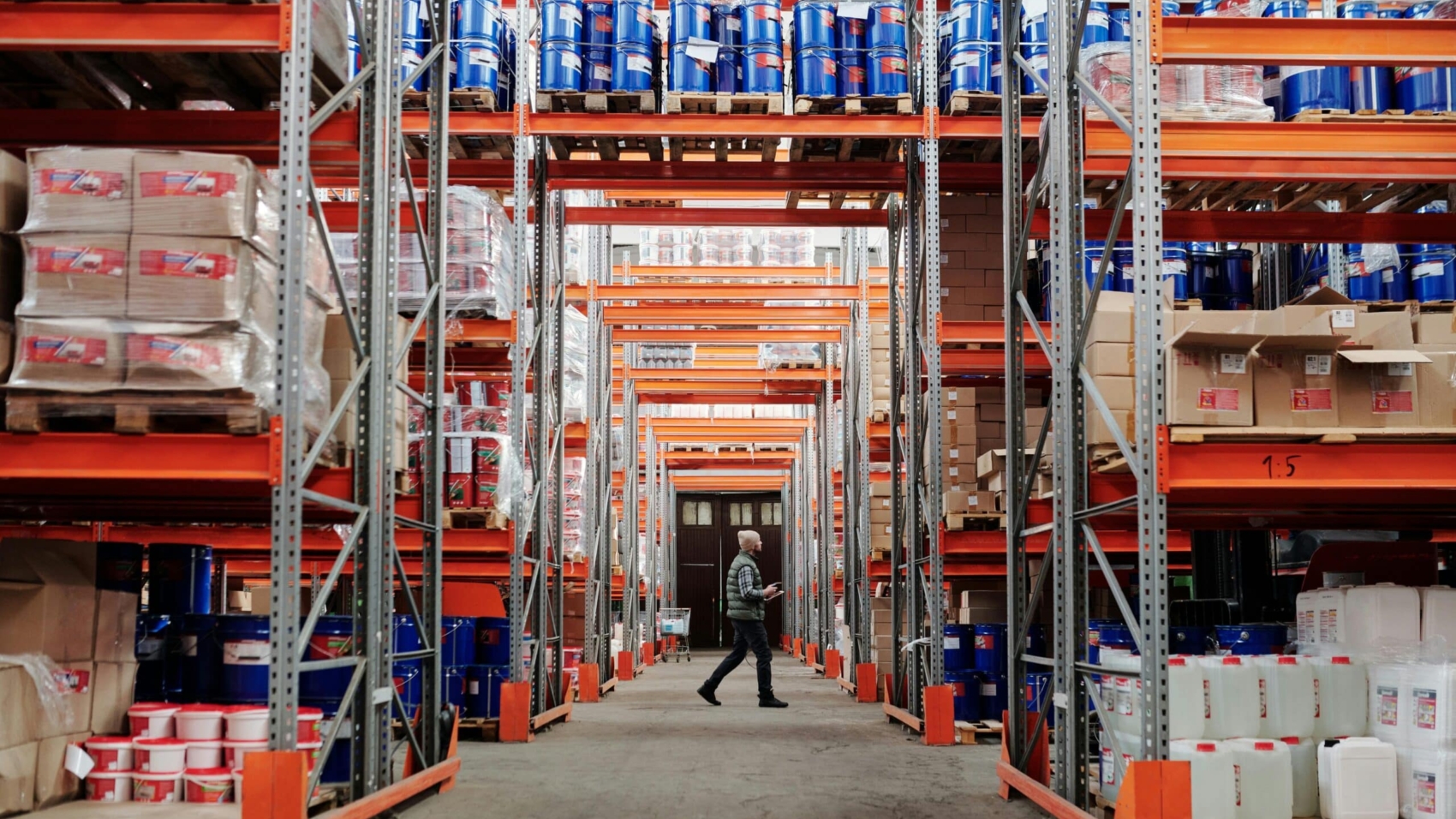 man walking in a warehouse