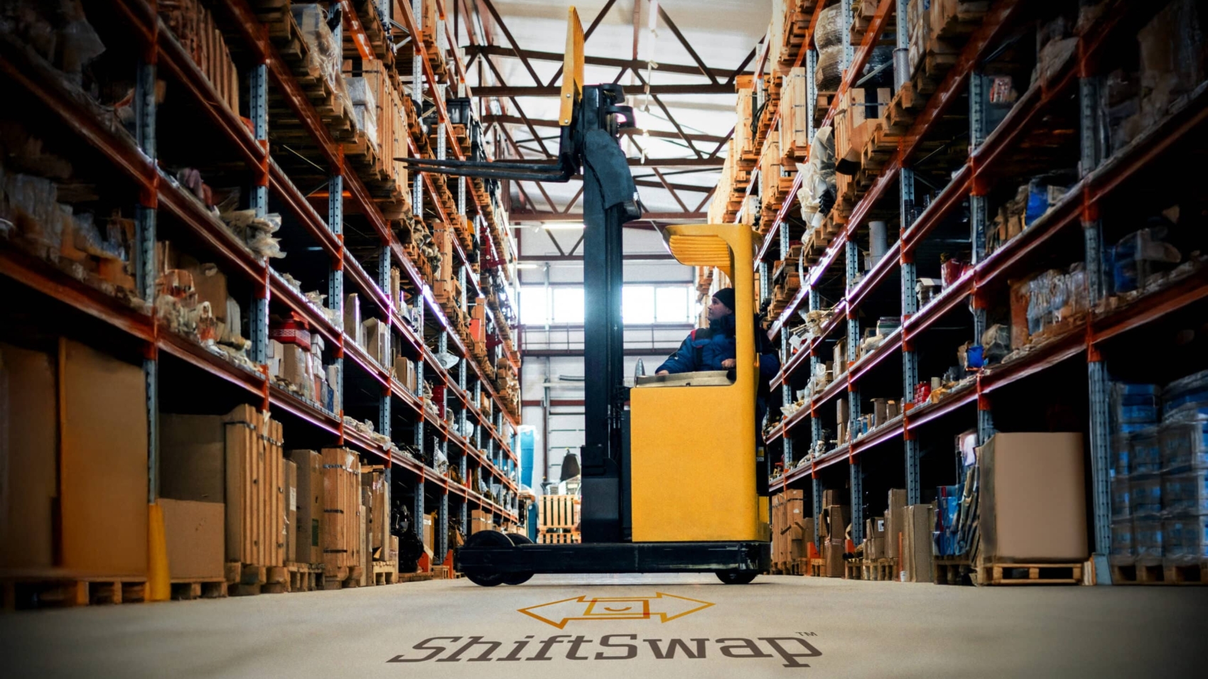 forklift operator moving to grab supplies