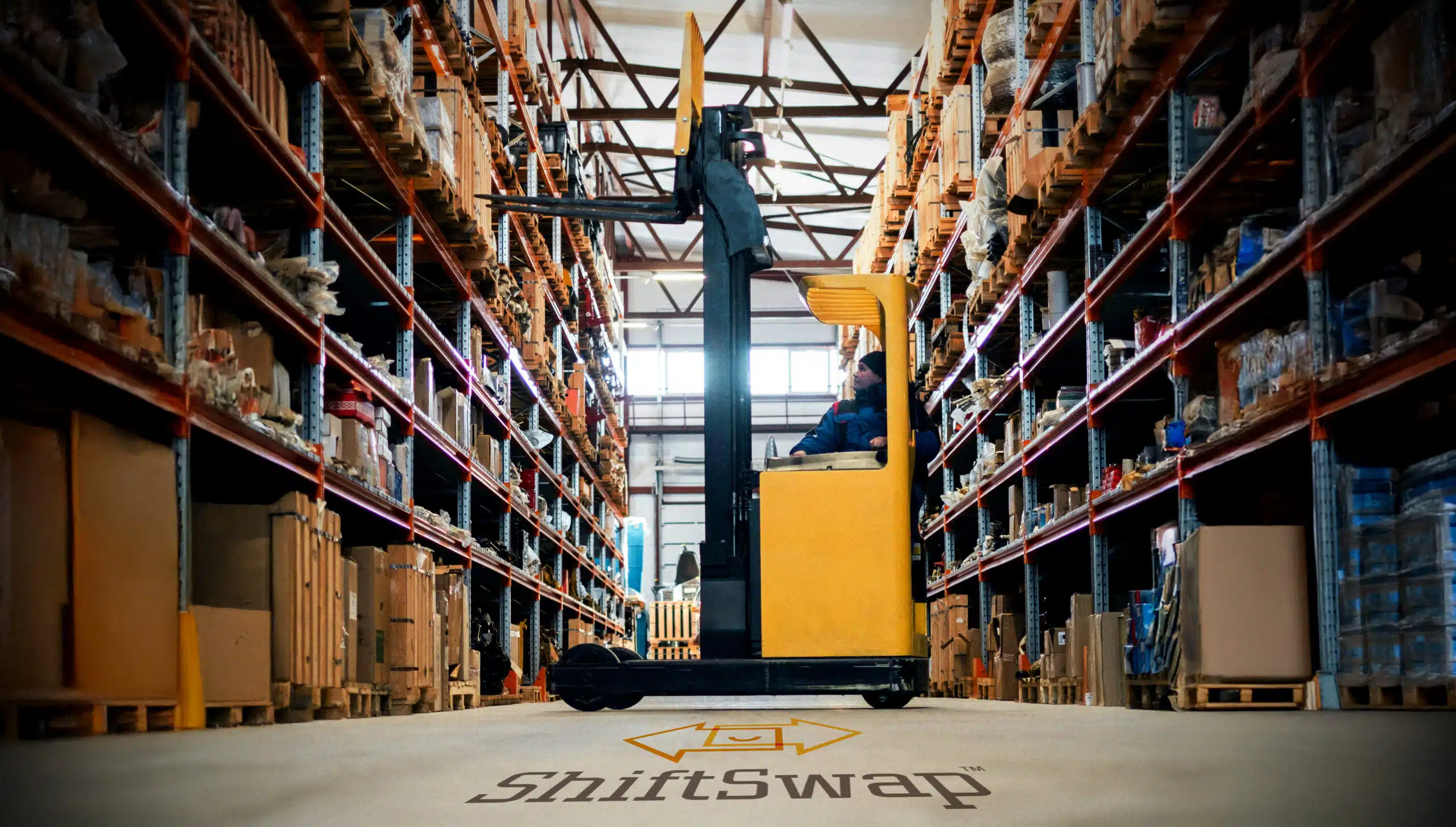 forklift operator moving to grab supplies