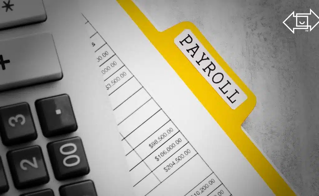 payroll folder under a calculator image for tariff and recession fear article