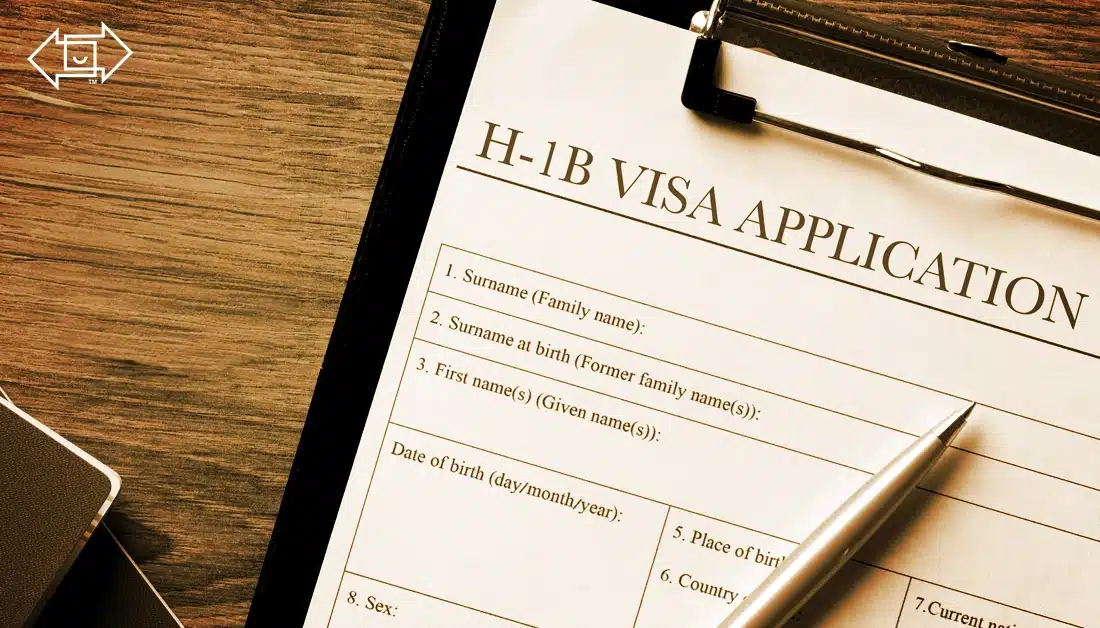 h-1b visa fee application form on clipboard