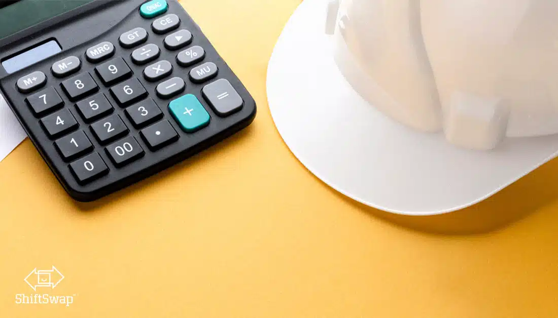 calculator and warehouse hard hat