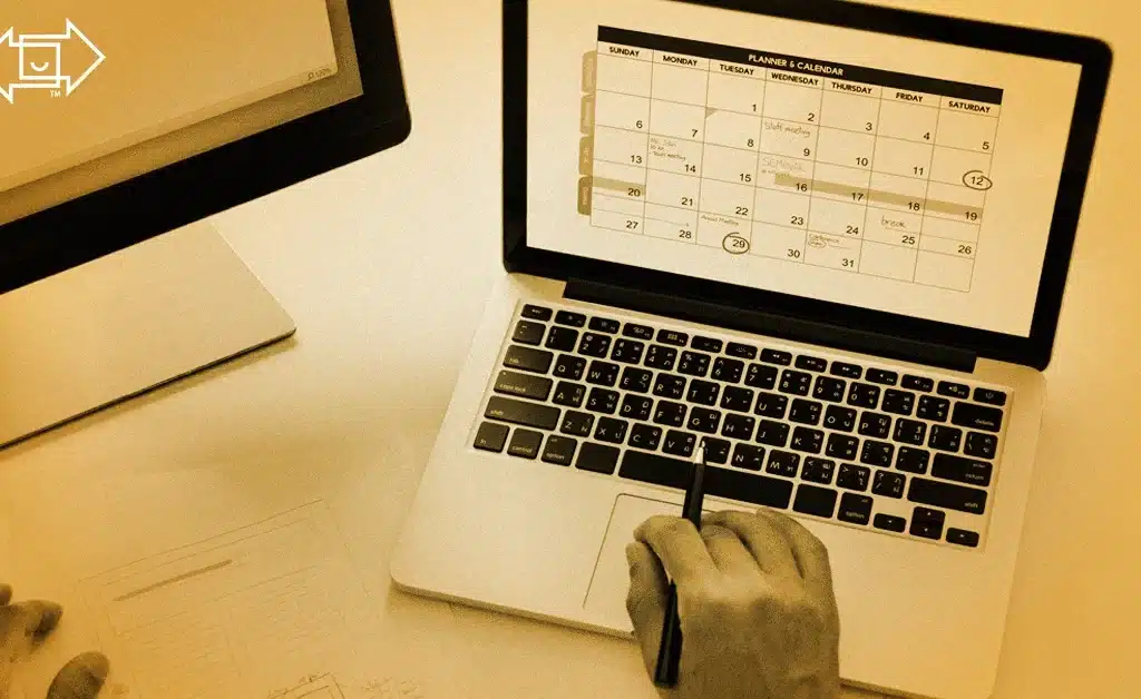 laptop with warehouse labor planning schedule on the screen