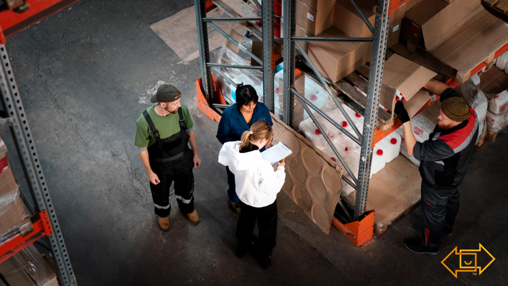 warehouse workers standing together discussing employee turnover in 2026