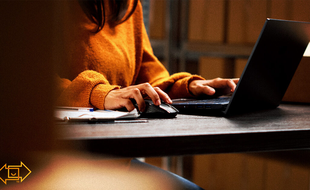 warehouse procurement leader working on a laptop