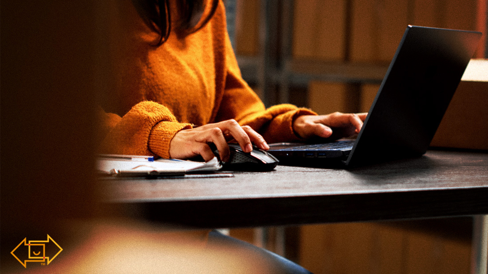 warehouse procurement leader working on a laptop