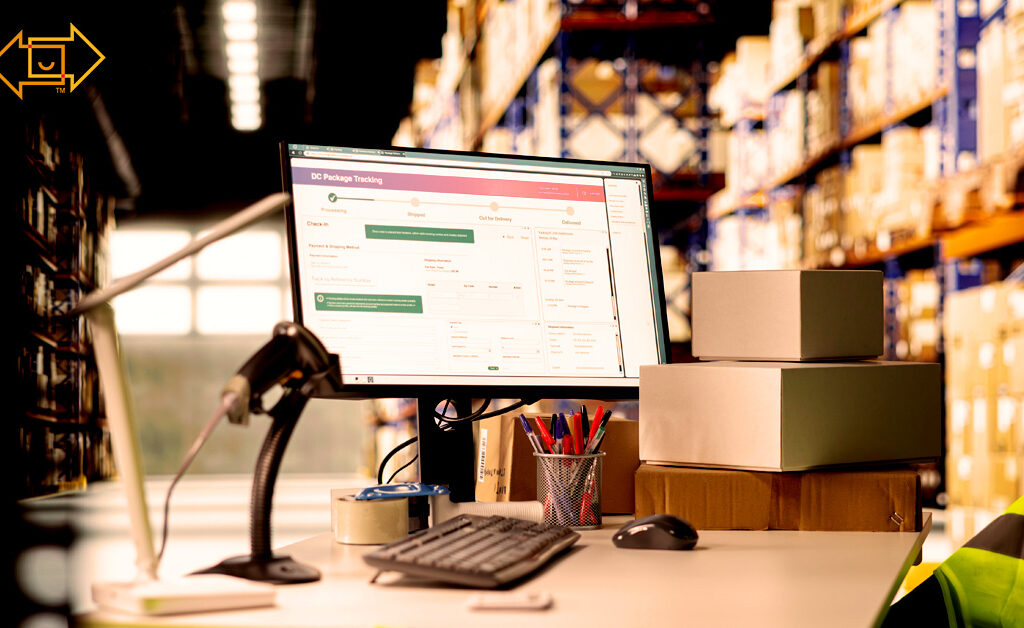 work computer in a warehouse with tracking and performance metrics on the screen