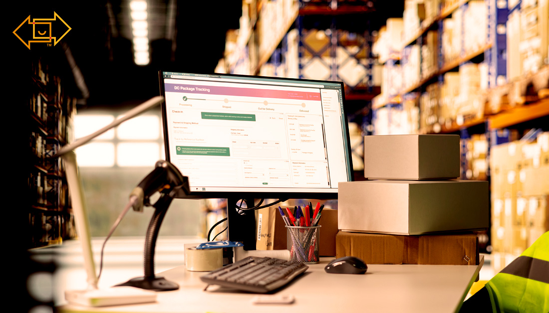 work computer in a warehouse with tracking and performance metrics on the screen