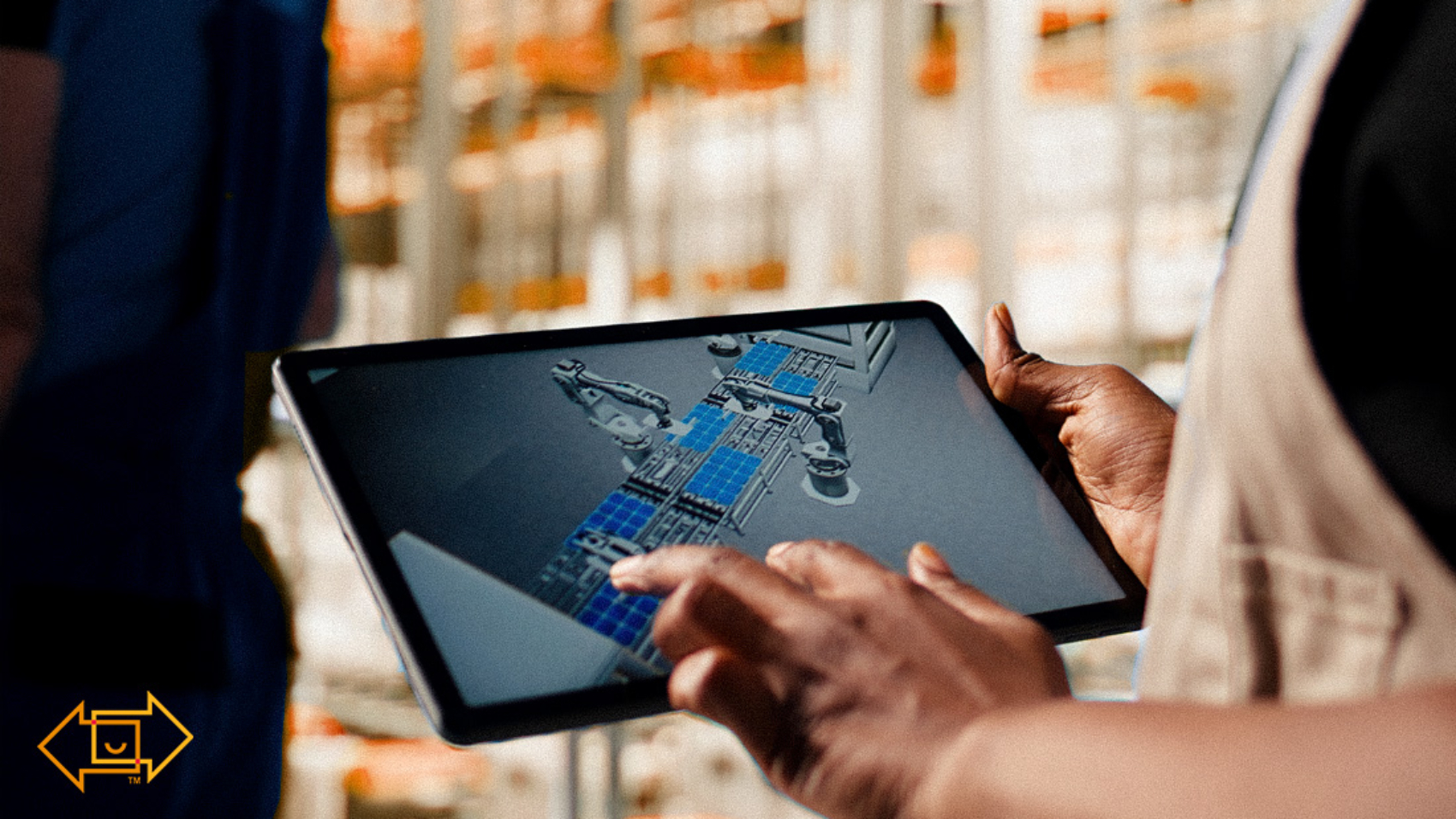 warehouse employee working on physical ai in warehouse operations on the ipad
